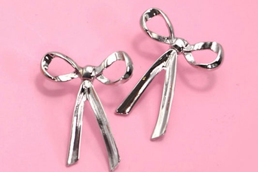 Dangling Silver Bow Earrings