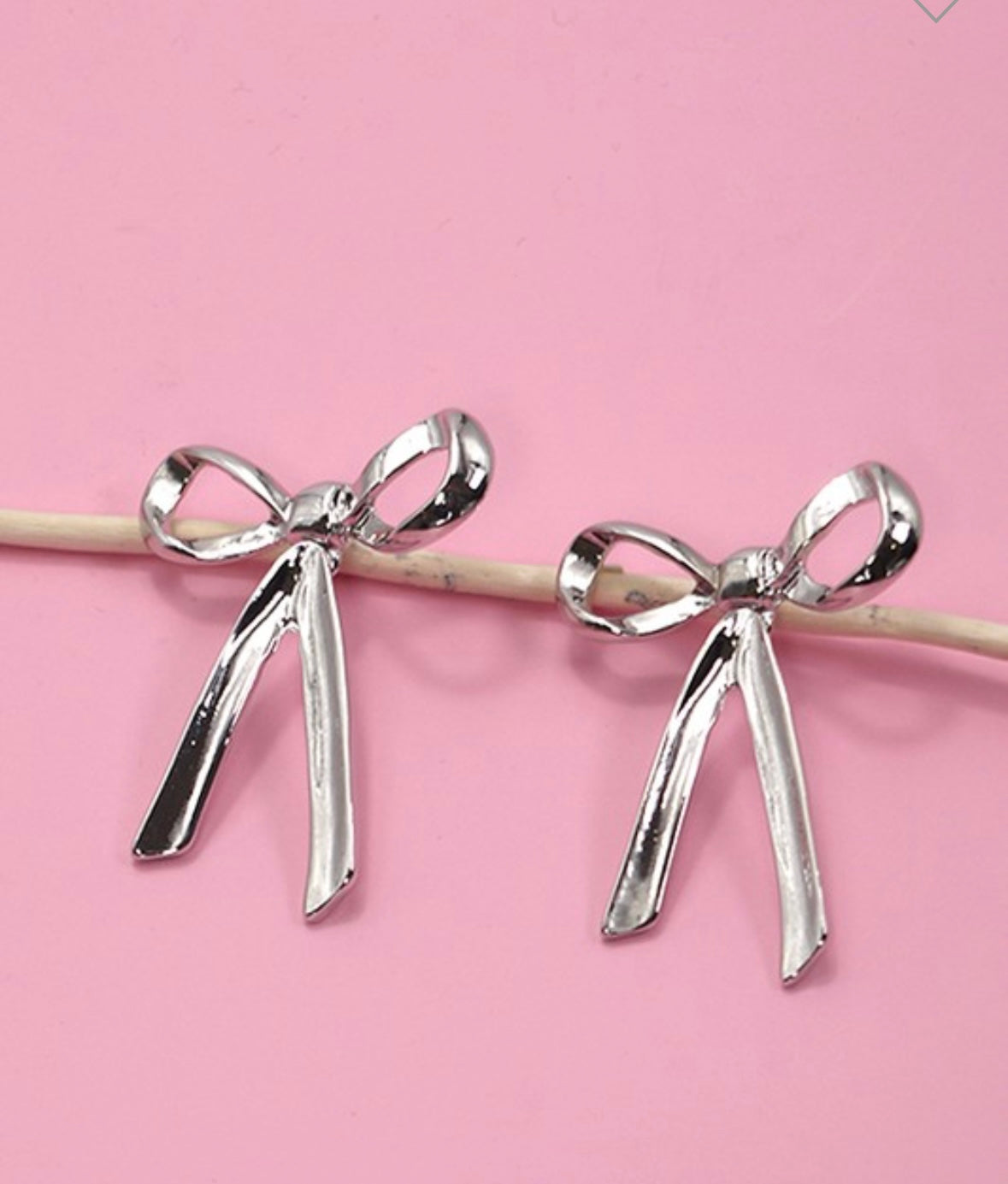 Dangling Silver Bow Earrings