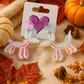 Iridescent Balloon Dog Skeleton Earrings