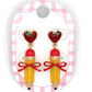 Apple with Dangling Pencil Earrings